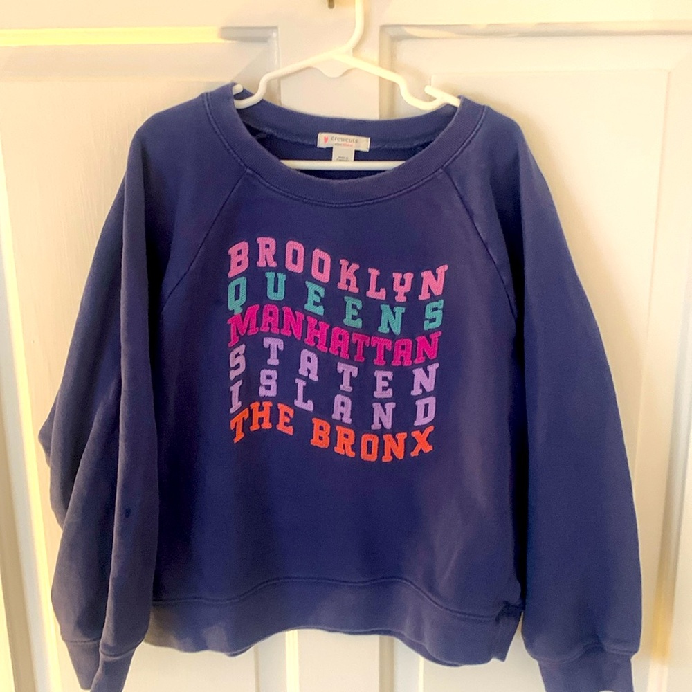 Crewcuts girl's purple New York sweatshirt.  Size: M 8-9